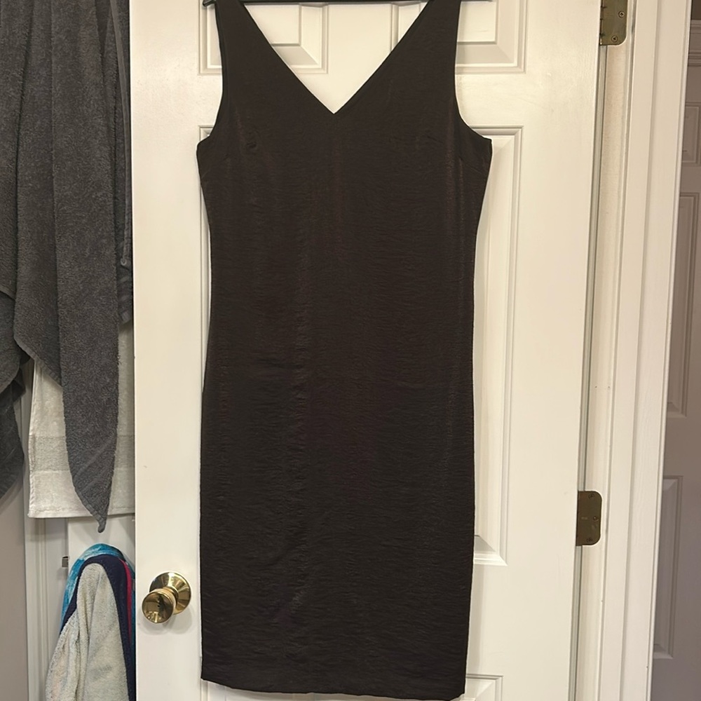Deep plum cocktail dress. Slight shimmer with V neck back and front.